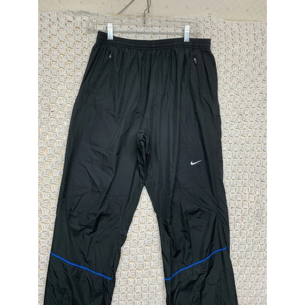 Nike Track Water Windbreaker Pants Men Sz L Black Running Activewear Zip‎ Ankle